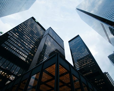 low angle photo of city high rise buildings during daytime