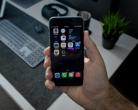 person holding black android smartphone