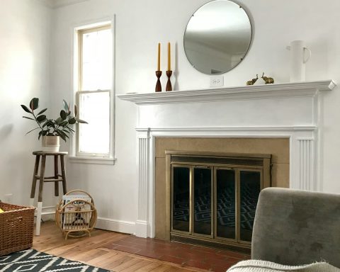 room with white wall and wooden floor